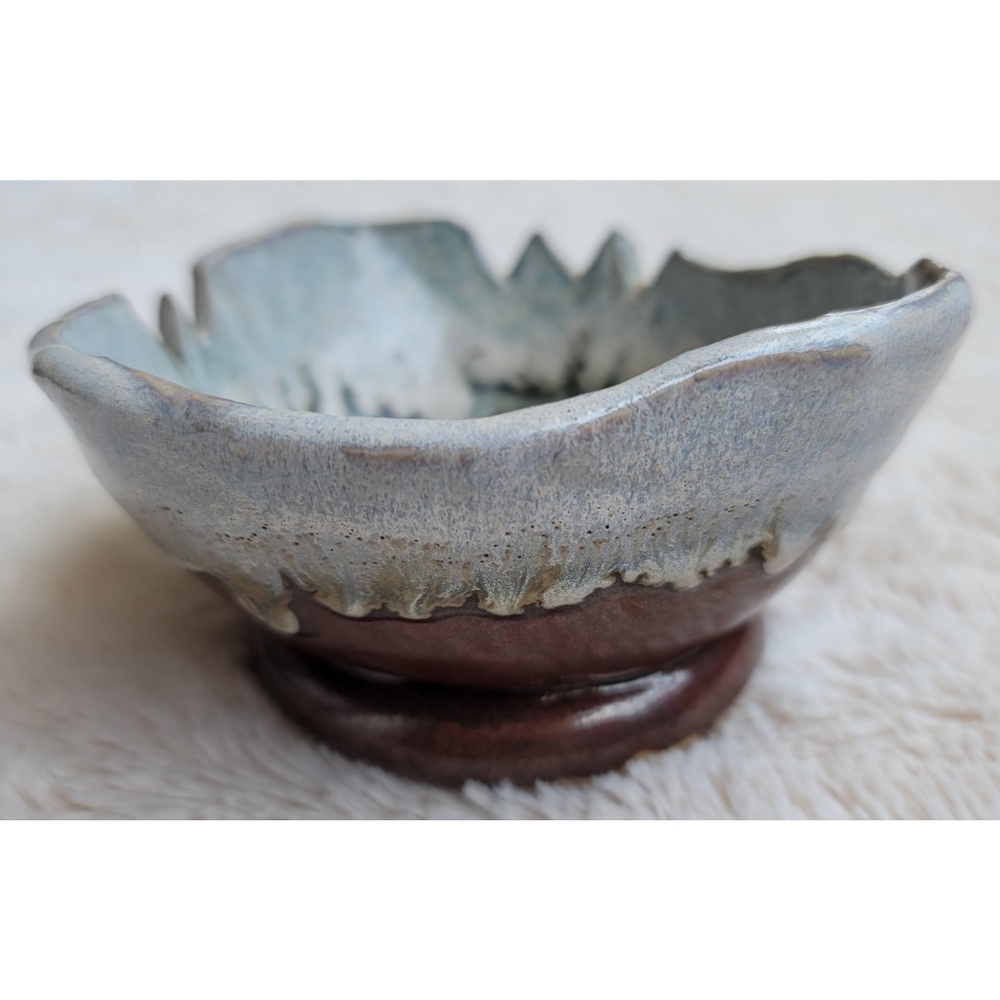 Brown, blue, and green pottery piece